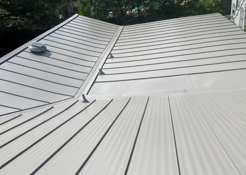 Solar attic fan installed on a metal roof for Roof Ventilation in South San Francisco